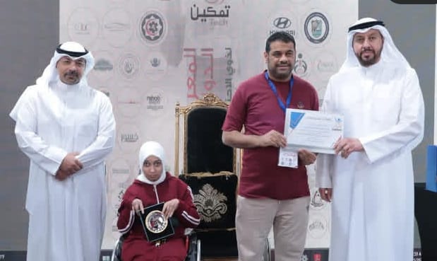 رئيس المعرض ناصر المرضي يكرم أعضاء الجمعية الكويتية لأهالي ذوي الإعاقة